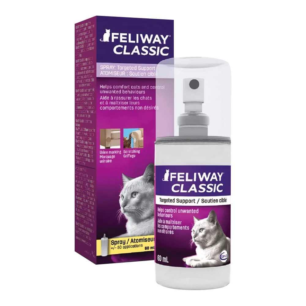 Imagen de caja con detalles morados y un gato en la portada, adelante se encuentra un atomizador transparente con una etiqueta del mismo color y diseño. Es el producto Feliway Classic Spray, feromonas para el comportamiento de tu gato