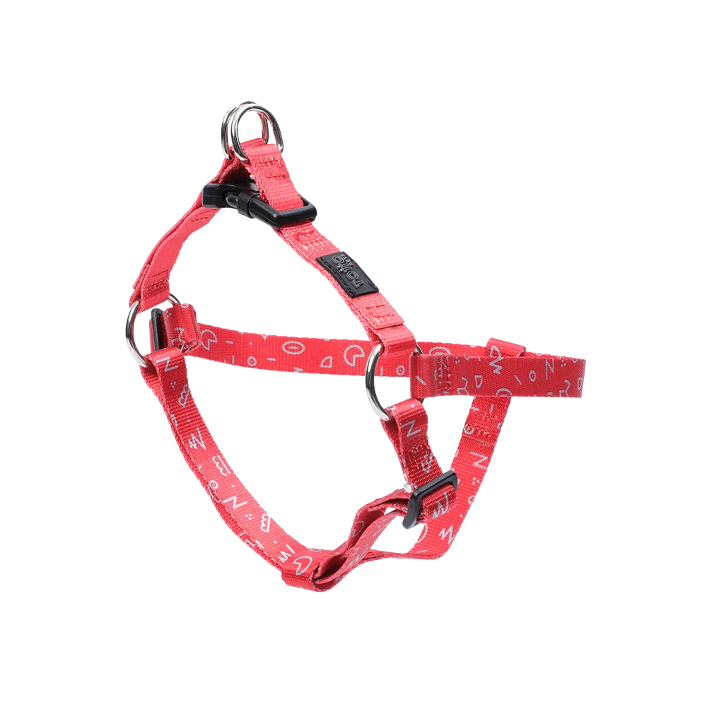 Arnes para perros color rojo con detalles geométricos blancos de la línea Totto en talla S. Tiene un patrón geométrico blanco, herrajes metálicos y una hebilla plástica negra.