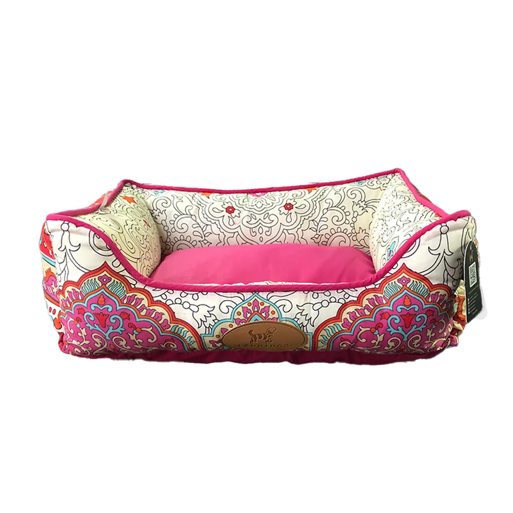 Imagen de Cama Fresca en Talla L para perros medianos, es de color verde y tiene un patrón geométrico con detalles blancos y grises