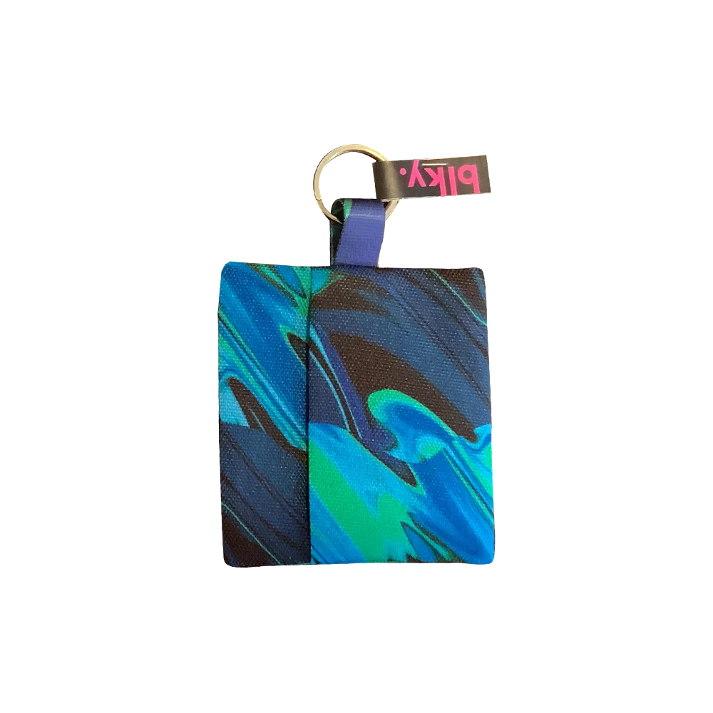 Sobre Porta Bolsas Para Paseo Blky con un estampado tipo agua marina en tonos azules