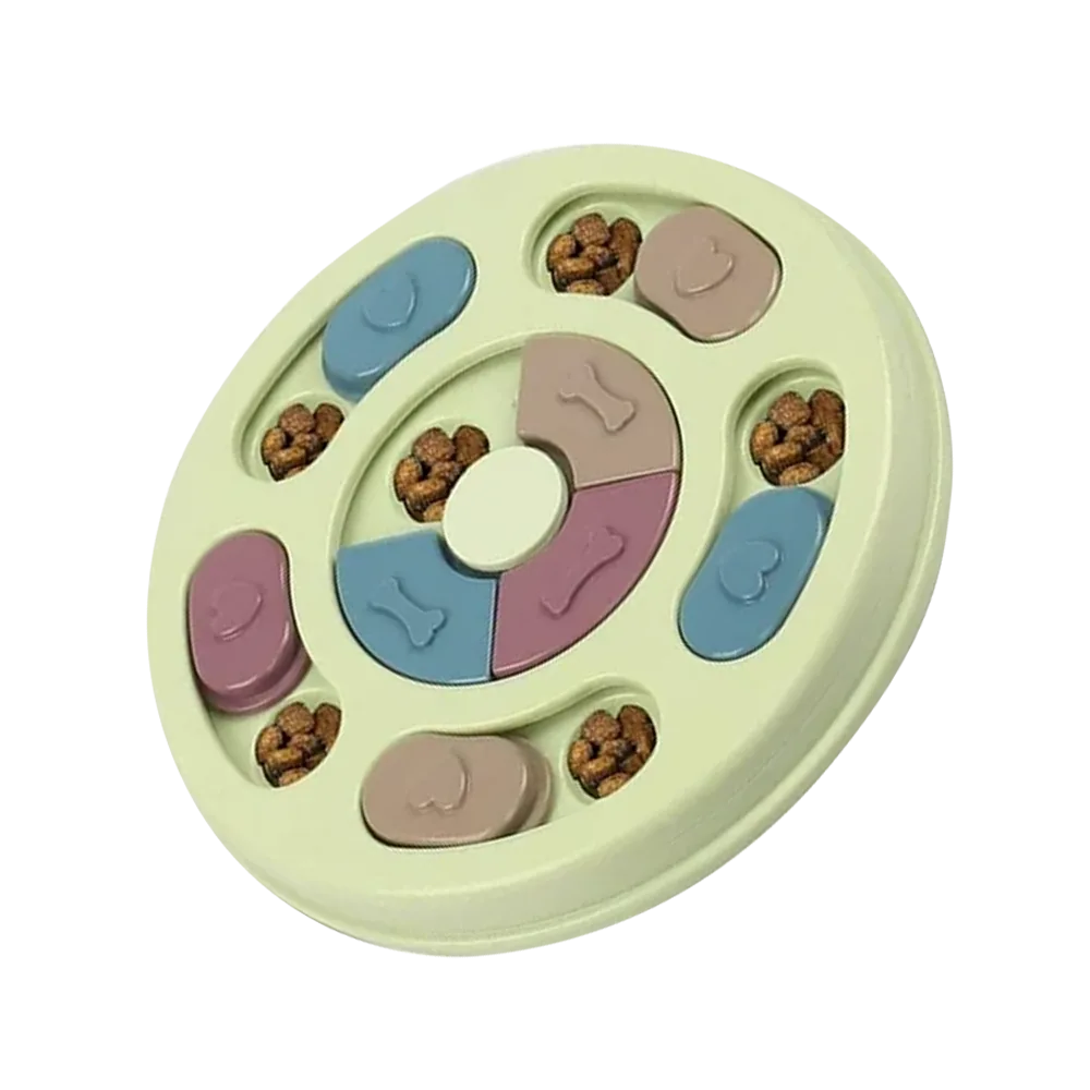 Rompecabezas de comida para mascotas color verde pastel, es redondo y tiene compartimientos para esconder la comida.