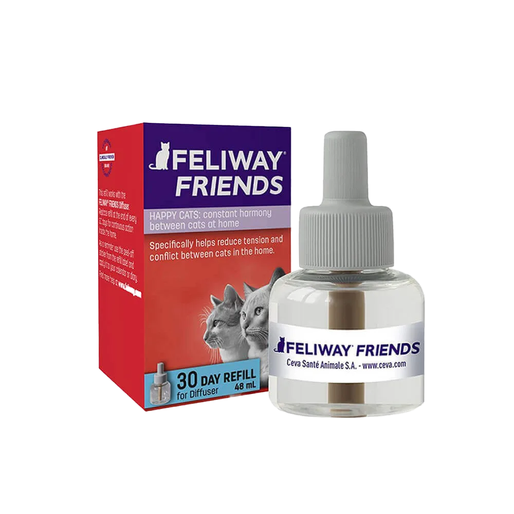 Caja color rojo con detalles morados y unfrasco transparente alado de recambio para difusor del producto Feliway Friends, feromonas para mejorar la convivencia en gatos