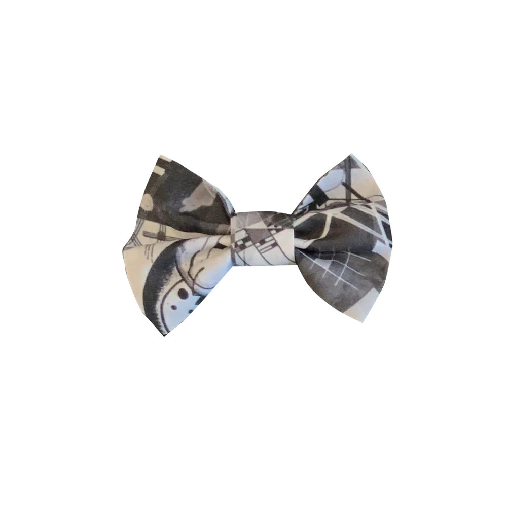 Corbatín para perros y gatos con un estampado geométrico en blanco y negro