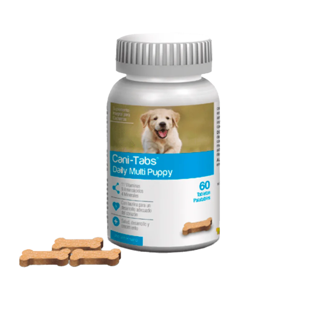 Frasco de Cani-Tabs Daily Multi Puppy, suplemento para cachorros en crecimiento. Es de color blanco, tiene detalles azul claro y la imagen de un perro sobre color verde.