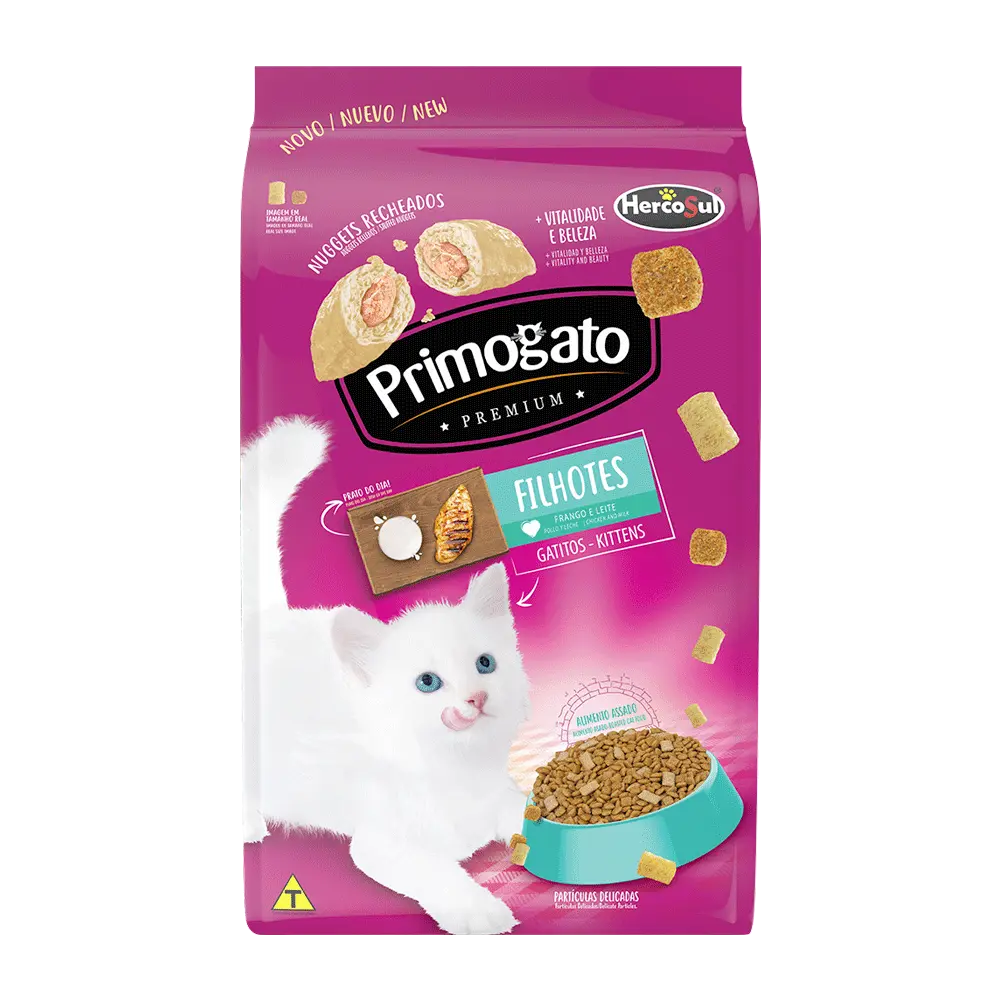 Imagen de bolsa de alimento para gatos Primogato Gatitos en su presentación de 1kg. Es de color violeta con la imagen de un gato blanco aproximandose a un plato de alimento.