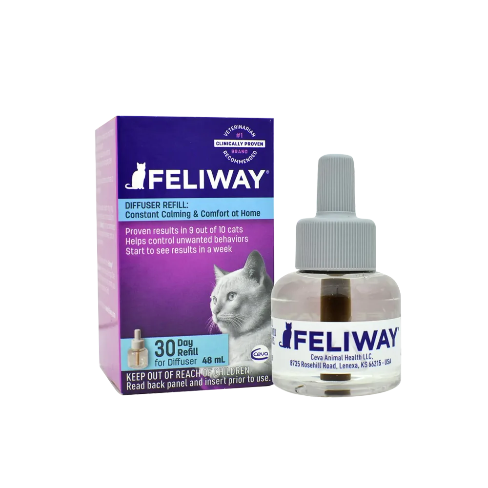 Caja morada con detalles fuccia y un repuesto de vidrio transparente de Feliway Classic Recambio. Es el repuesto para el difusor que viene en Kit. 