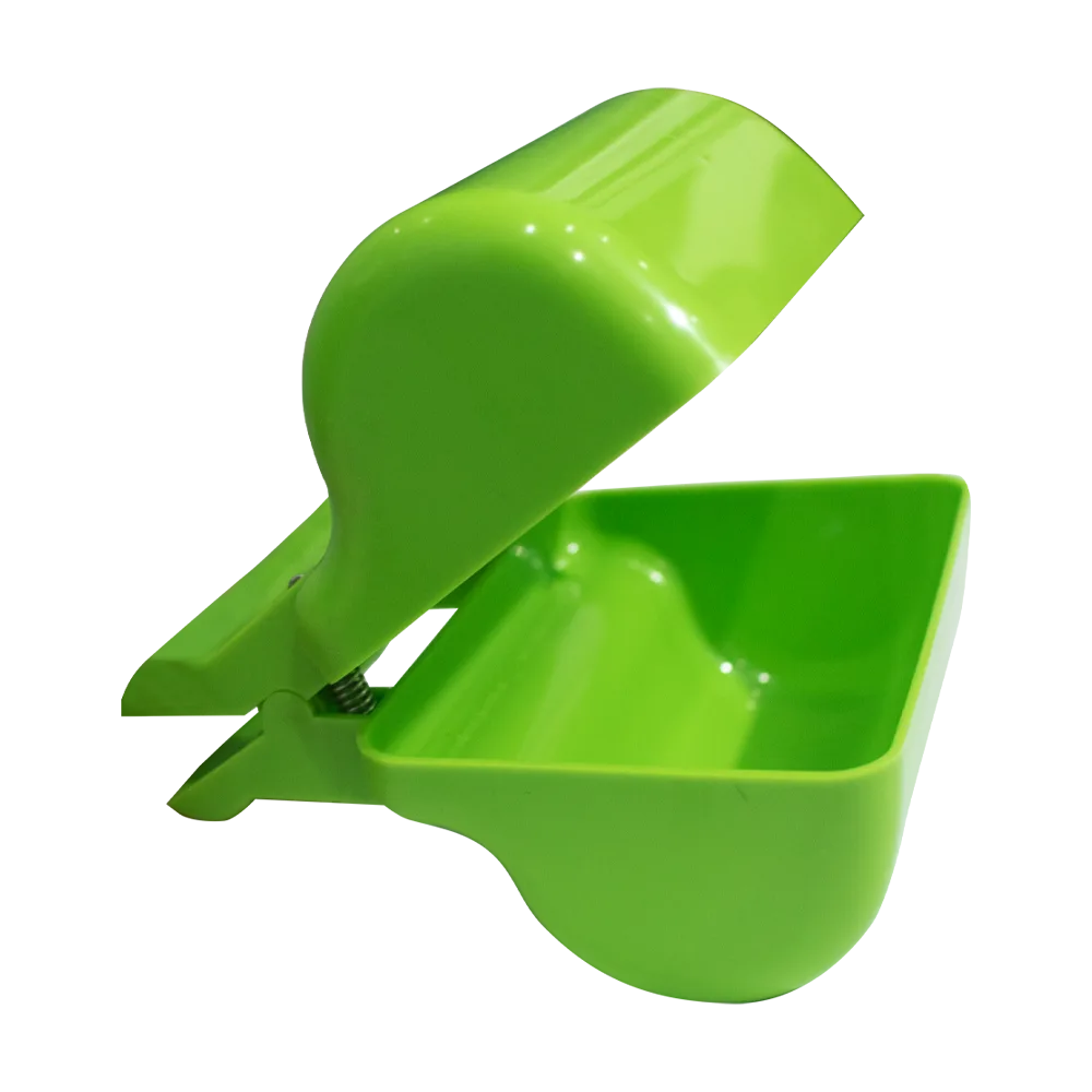 Pala Recolectora de heces para paseos color verde abierta 