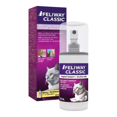 Caja y frasco de Feliway Classic un spray de feromonas para gatos. Es de color violeta con detalles fucsias y rosado oscuro. Tiene la imagen de un gato acostado en la parte inferior de la etiqueta