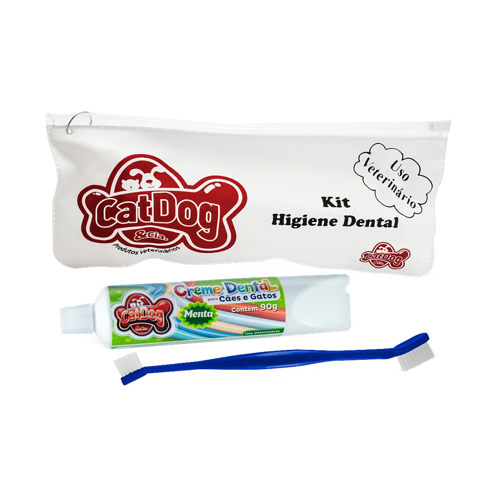 Pack Pasta Dental y Cepillo de marca CatDog, es un estuche blanco que con letras negras "Kit Higiene Dental, Usu veterinario" atrás de un tubo de pasta dental blanco con etiqueta verde ya que es sabor menta y al frente tiene un cepillo de dientes color azul de dos cabezas con cerdas blancas 