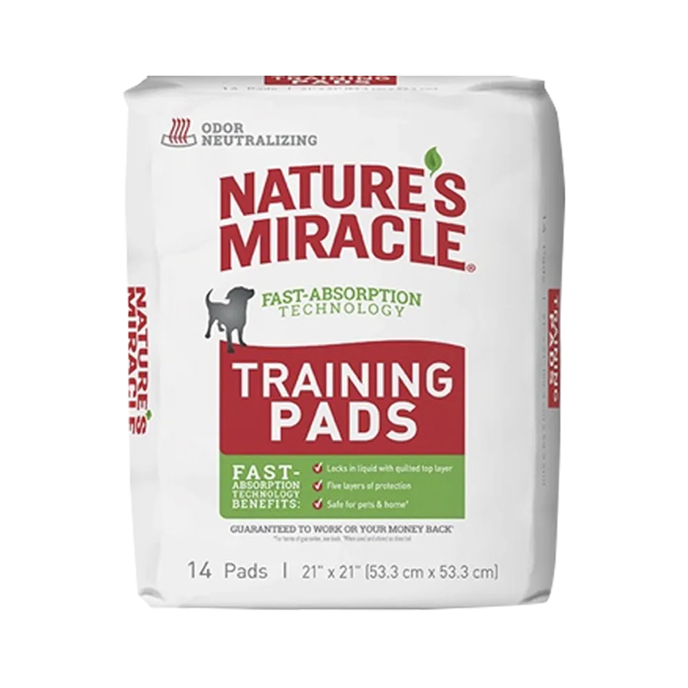 Empaque blanco con detalles rojos y verdes de Tapetes de Entrenamiento Nature's Miracle. 